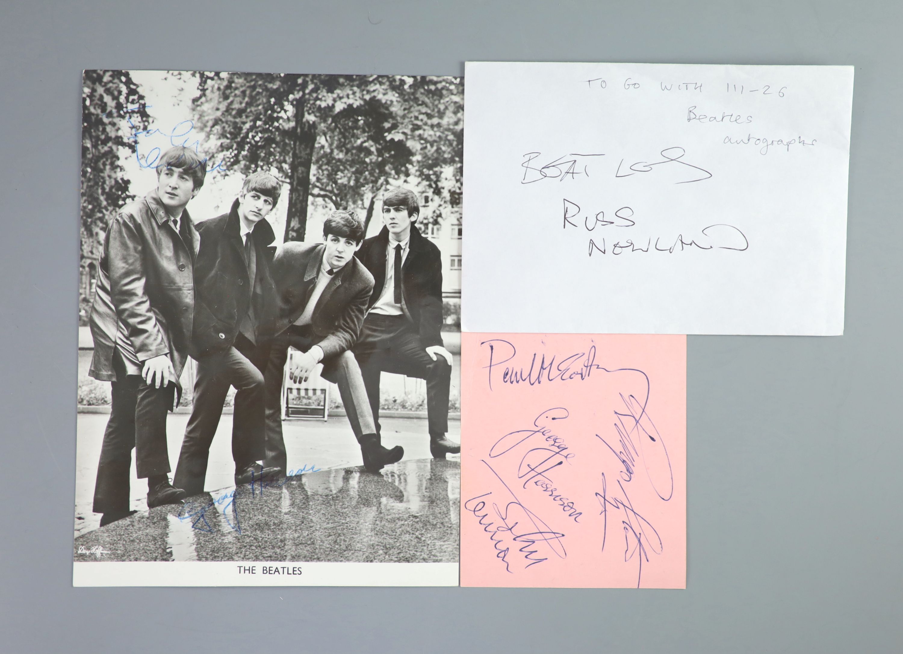 The Beatles, a set of four autographs on pink paper and a contemporary promotional photo signed by George Harrison, early 1960s, Paper 11 x 9.5 cm, photo 21.5 x16 cm